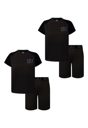 Two sets of black short-sleeve shirts and matching shorts, both with "CR7 Nightwear" logo on shirts and "ROJO" on shorts waistband.