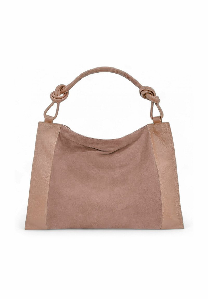 Sac à main en cuir suédé et cuir marron, de grande taille, avec un détail en nœud sur la poignée et une texture lisse. Présente des panneaux latéraux contrastants.