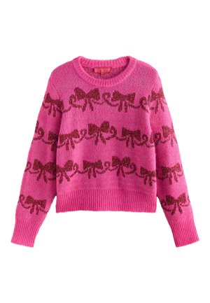 Rožinis megztinis su ilgomis rankovėmis, puoštas rudu blizgančių kaspinų raštu ir briaunuotu apačios kraštu. Apvalus iškirptės kraštas ir minkšta tekstūra.