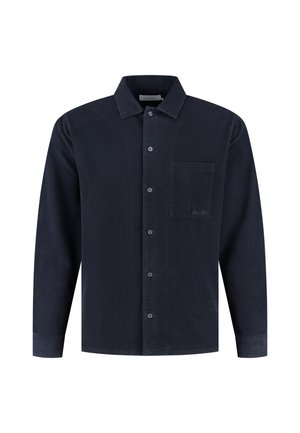 Navy corduroy shirt with long sleeves, pointed collar, front button closure, single chest pocket, and subtle striped texture.