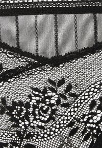 Passionata Slip - schwarz