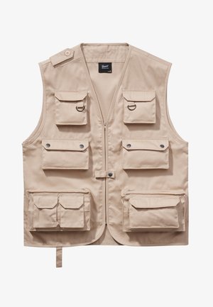 Beige cargo vest made of durable fabric, featuring multiple pockets with flaps, zip closure, and a collar. Accents include metal snap buttons and rings.
