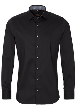 Camicia elegante da uomo nera a maniche lunghe con chiusura frontale con bottoni e fodera interna del colletto a fantasia.