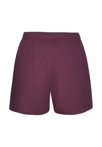 Violetti shortsit joustavalla vyötäröllä, valmistettu sileästä kankaasta. Malli on yksinkertainen, ilman taskuja tai lisäkuvioita.