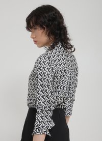 Calliope FANTAISIE  - Button-down blouse - une variante