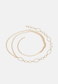 Geselecteerd, gold-coloured