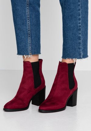 Højhælede støvletter - berry