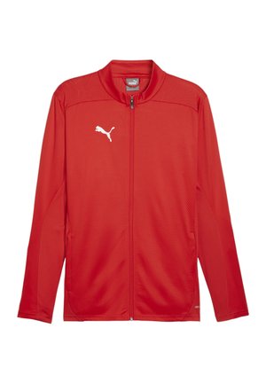 Rød zip-up jakke lavet af letvægtsstof med mesh tekstur. Har en opretstående krave og hvidt Puma-logo på venstre bryst.