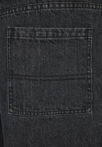 Urban Classics Jeans Relaxed Fit - black acid washed