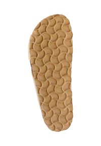 Semelle en caoutchouc de sandale avec un motif en vagues de couleur beige, conçue pour l'adhérence et la durabilité, avec une forme légèrement courbée.