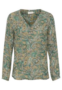 Blouse à manches longues beige avec un motif cachemire complexe en vert et noir. Décolleté en V ; tissu doux au toucher lisse.