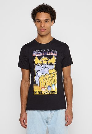 Black cotton t-shirt featuring a graphic design of a character's hand with text: "BEST DAD IN THE UNIVERSE" in yellow and blue accents.
