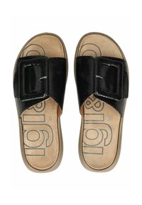Black slide sandals with a textured upper and a large buckle detail. The insole is tan with printed branding and a contoured footbed.