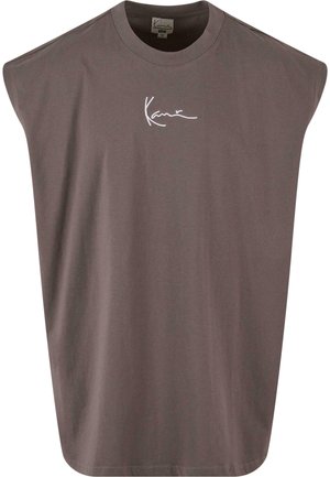 Przesadzony brązowy bawełniany T-shirt z rękawami w kształcie podkowy, z białym logo na przodzie, teksturowana tkanina oraz prosty dół.