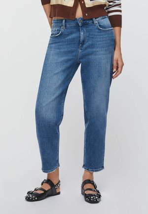 - Jeansy Relaxed Fit