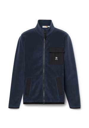 Navy-Fleecejacke mit hohem Kragen, einem Frontreißverschluss und schwarzen Stoffakzenten sowie einer Brusttasche, die ein Logo zeigt.