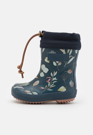 Børne gummistøvle i marineblå med blomsterprint, foldbar kant og brun justerbar snøre.