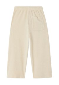 Pantalon en polaire couleur crème à jambes larges avec taille élastique et une poche plaquée au dos, présenté à plat sur un fond blanc.