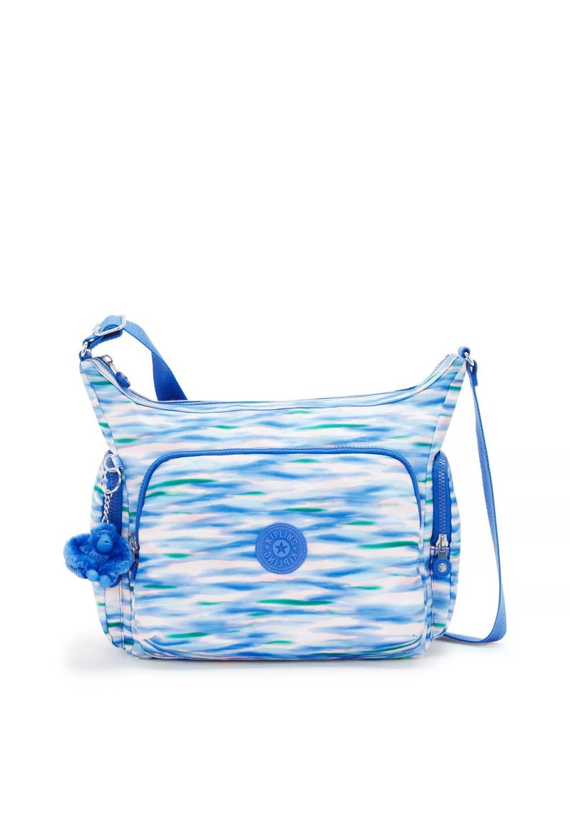 Blå mønstret crossbody taske lavet af holdbart materiale, med en lynlåslomme, justerbar strop og lille abe nøglering som accent.
