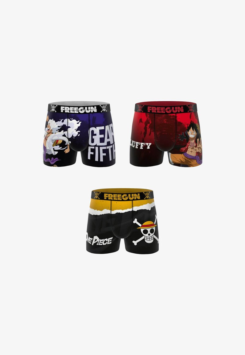 Trois paires de boxers colorés mettant en avant des personnages et logos de One Piece, avec des ceintures de marque Freegun.