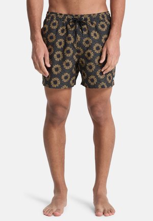 Schwarze Badeshorts mit gelbem Blumenmuster, elastischem Bund mit Kordelzug und lässiger Passform. Weiche Stoffstruktur.