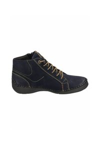 Chaussure mi-haute bleu marine avec lacets beige, tige en cuir, surpiqûres contrastées, semelle en caoutchouc et bout arrondi. Équipée d'une fermeture éclair sur le côté.