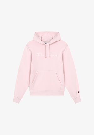 Sweat à capuche rose en tissu doux, doté d'une poche frontale, d'une capuche avec cordon de serrage et du logo blanc "Champion" sur la poitrine. Poignets et ourlet côtelés.