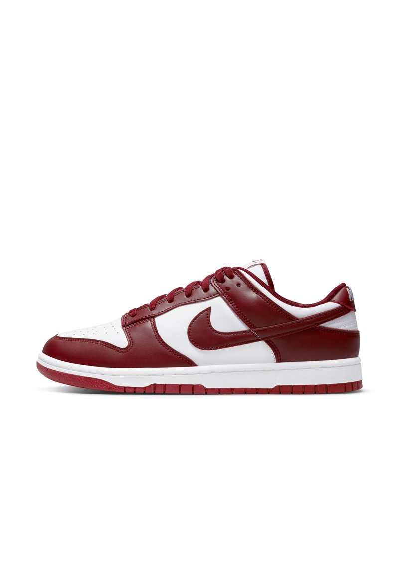 Nike sneakers with a maroon and white leather upper, featuring a padded collar, round laces, and a textured rubber sole.