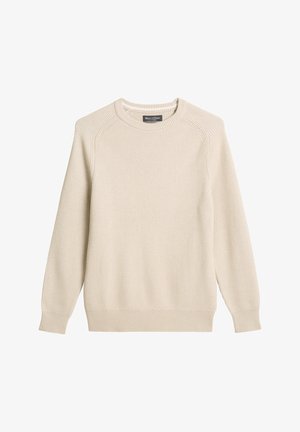 Beżowy sweter dziany z okrągłym dekoltem, długimi rękawami raglanowymi oraz ściągaczami na mankietach i u dołu. Teksturowany materiał o subtelnym wzorze.