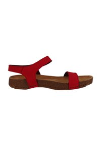 Sandal rojo con correas elásticas, suela similar al corcho y un diseño plano con punta descubierta. Estilo minimalista, construcción ligera.