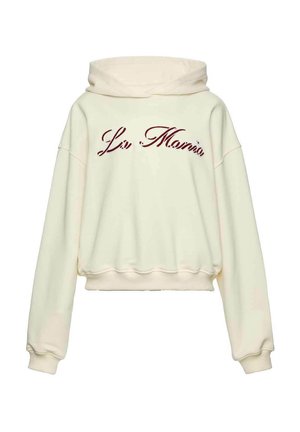 Kremowa krótka bluza z kapturem i sznurkiem, z bordowym, kursywnym napisem "La Moma" na przodzie oraz ściągaczami na mankietach i u dołu.