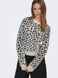 Kootud kampsun beežipõhjaga, mustade leopardimustritega, ümara kaelusega, pikkade varrukatega ning soonikkoes ääre ja varrukaservadega. Pehme, tekstuuriga kangas.