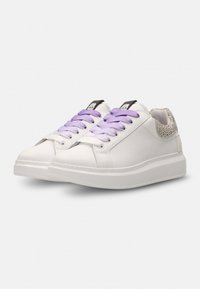 White leather sneakers with a textured grey and black accent on the heel, lavender laces, and a smooth rubber sole.