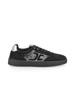 Black low-top sneaker with silver studs forming a design on the side and a silver heel accent. Flat rubber sole and lace-up closure.