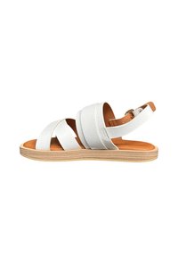 Sandales blanches en cuir avec trois larges sangles, une semelle intérieure en cuir beige et une semelle en bois. Comprend une sangle de cheville ajustable.