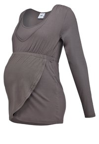 Long-sleeve maternity top in dark gray, featuring a deep neckline, gathered waist, and wrap style for accommodating a growing belly.