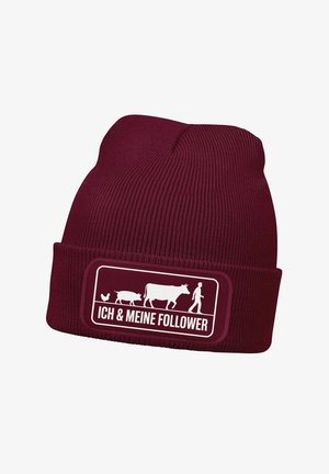 Burgundy knitted beanie with a folded cuff, featuring a white graphic of a farmer and livestock, and the text "ICH & MEINE FOLLOWER."