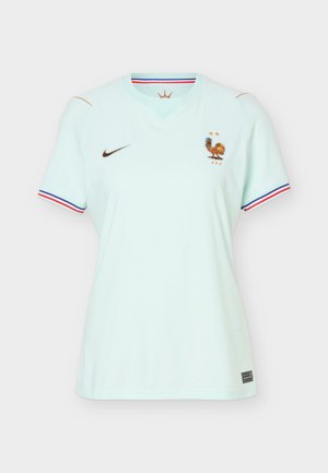 Camiseta de fútbol de manga corta de color azul claro con el logo de Nike, emblema del gallo de la Federación Francesa de Fútbol con dos estrellas y ribete en rojo, blanco y azul en las mangas.