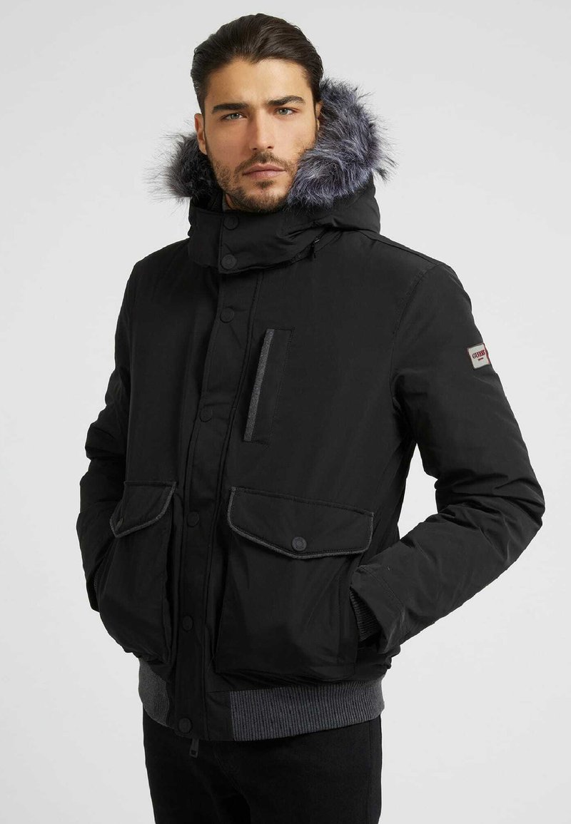 Guess Down jacket schwarz/black Zalando.ie