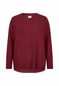 Burgundi színű, hosszú ujjú, V-nyakú felső, puha anyagból, laza szabással és ívelt aljjal, finom textúrával és ejtett vállú fazonnal.