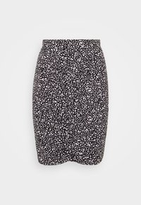 Jupe noire avec un design ajusté, présentant un motif à pois blancs et une texture lisse. Taille élastique pour plus de confort.