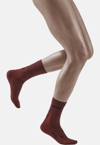CEP COLD WEATHER COMPRESSION SOCKS RUNNING MID CUT - MADE IN GERMANY - Sportsocken - dark orange