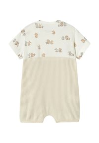 Mono de color beige claro con parte superior crema que presenta diversos estampados de animales, mangas cortas y textura acanalada en la parte inferior.