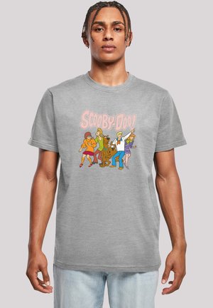 Grå bomull t-skjorte med en fargerik "Scooby-Doo" grafikk med karakterer som poserer. Kortermet og rund hals design.