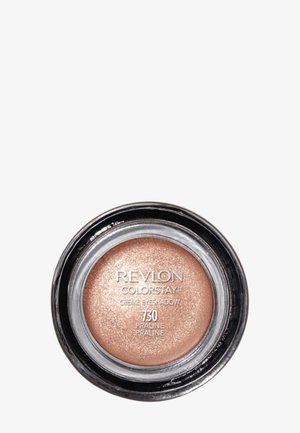 Revlon Colorstay crème ögonskugga i Praline, en rund, ljusbronsfärg med en skimrande finish i en transparent svart behållare.