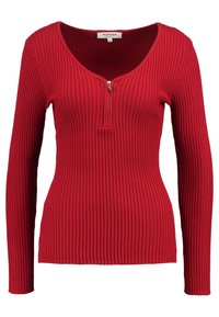 Rood geribbeld langärmelig shirt met een ronde hals en een ritssluiting aan de voorkant. Heeft een aansluitend ontwerp voor een strakke pasvorm.