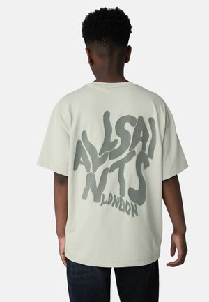 Hellgrünes übergroßes T-Shirt mit großem grauem Schriftzug "ALLSAINTS LONDON" auf der Rückseite. Weicher Baumwollstoff mit kurzen Ärmeln.