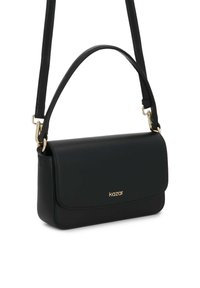 Musternahast mustast nahast õlakott, millel on kullatud logo, klapiga sulgemine, reguleeritav rihm ja elegantne ristkülikukujuline kuju.