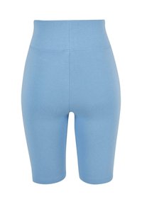 Cuissards de cyclisme bleu clair taille haute avec un design lisse, ajusté et une longueur mi-cuisse.