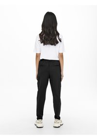 ONLY Träningsbyxor - black